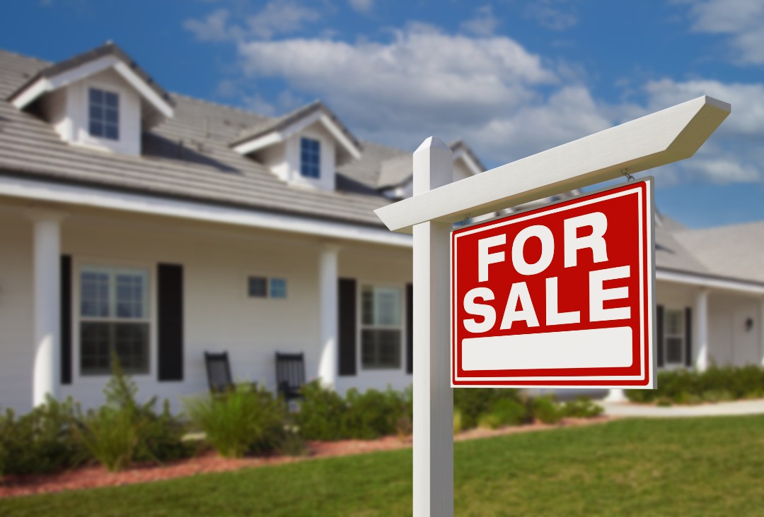 For Sale Sign in Front of New House